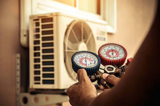 Professional Heat Pump Repair technician working in Pilot Point, TX
